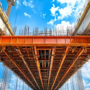 construction-modern-highway-bridge-with-steel-beams-suspended-formwork-blue-sky
